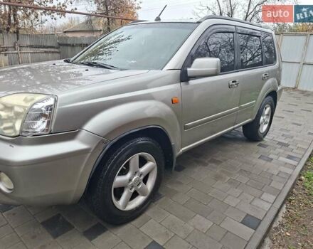 Серый Ниссан ИксТрейл, объемом двигателя 2.49 л и пробегом 286 тыс. км за 5800 $, фото 4 на Automoto.ua