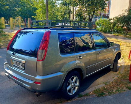 Сірий Ніссан ІксТрейл, об'ємом двигуна 2 л та пробігом 305 тис. км за 5200 $, фото 5 на Automoto.ua