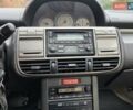 Сірий Ніссан ІксТрейл, об'ємом двигуна 2 л та пробігом 335 тис. км за 4800 $, фото 9 на Automoto.ua