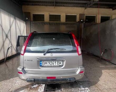 Серый Ниссан ИксТрейл, объемом двигателя 2 л и пробегом 262 тыс. км за 7079 $, фото 7 на Automoto.ua