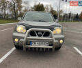 Серый Ниссан ИксТрейл, объемом двигателя 2 л и пробегом 336 тыс. км за 5750 $, фото 1 на Automoto.ua