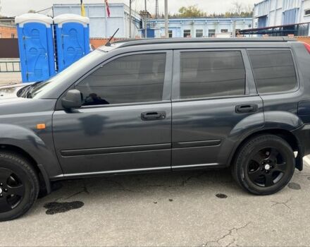 Серый Ниссан ИксТрейл, объемом двигателя 2 л и пробегом 420 тыс. км за 4000 $, фото 4 на Automoto.ua