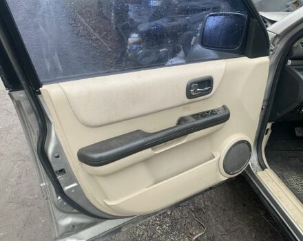 Серый Ниссан ИксТрейл, объемом двигателя 2 л и пробегом 280 тыс. км за 3500 $, фото 7 на Automoto.ua