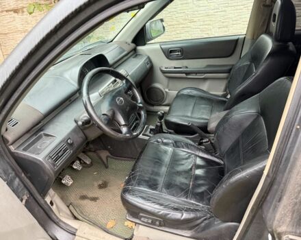 Серый Ниссан ИксТрейл, объемом двигателя 2.2 л и пробегом 290 тыс. км за 4000 $, фото 4 на Automoto.ua