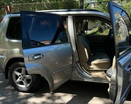 Серый Ниссан ИксТрейл, объемом двигателя 2.2 л и пробегом 281 тыс. км за 6000 $, фото 2 на Automoto.ua