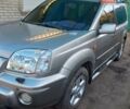 Сірий Ніссан ІксТрейл, об'ємом двигуна 2 л та пробігом 253 тис. км за 5500 $, фото 3 на Automoto.ua