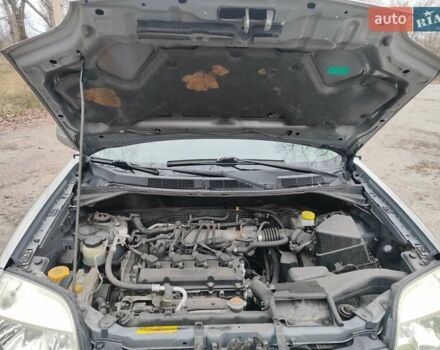 Сірий Ніссан ІксТрейл, об'ємом двигуна 2 л та пробігом 200 тис. км за 5900 $, фото 11 на Automoto.ua