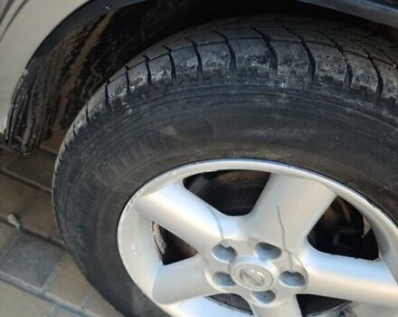 Сірий Ніссан ІксТрейл, об'ємом двигуна 2 л та пробігом 320 тис. км за 5500 $, фото 4 на Automoto.ua