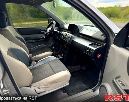 Серый Ниссан ИксТрейл, объемом двигателя 2.2 л и пробегом 393 тыс. км за 6300 $, фото 2 на Automoto.ua