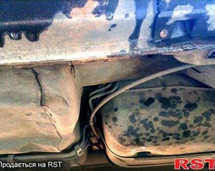 Сірий Ніссан ІксТрейл, об'ємом двигуна 2.5 л та пробігом 240 тис. км за 5800 $, фото 11 на Automoto.ua