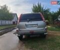 Серый Ниссан ИксТрейл, объемом двигателя 2 л и пробегом 280 тыс. км за 6000 $, фото 3 на Automoto.ua