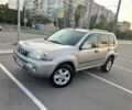 Сірий Ніссан ІксТрейл, об'ємом двигуна 2.2 л та пробігом 200 тис. км за 3650 $, фото 1 на Automoto.ua