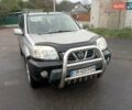Серый Ниссан ИксТрейл, объемом двигателя 2 л и пробегом 335 тыс. км за 3100 $, фото 1 на Automoto.ua