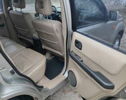 Сірий Ніссан ІксТрейл, об'ємом двигуна 2 л та пробігом 200 тис. км за 5900 $, фото 15 на Automoto.ua