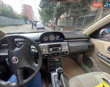 Серый Ниссан ИксТрейл, объемом двигателя 2 л и пробегом 262 тыс. км за 7079 $, фото 17 на Automoto.ua