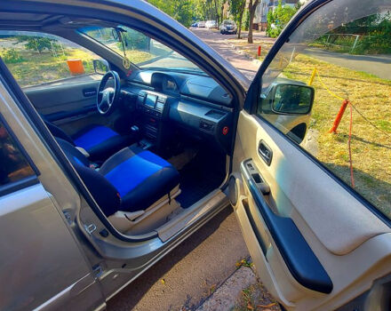 Сірий Ніссан ІксТрейл, об'ємом двигуна 2 л та пробігом 305 тис. км за 5200 $, фото 9 на Automoto.ua