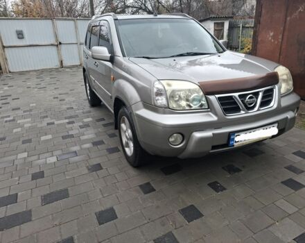 Серый Ниссан ИксТрейл, объемом двигателя 2.5 л и пробегом 286 тыс. км за 5800 $, фото 1 на Automoto.ua