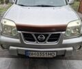 Серый Ниссан ИксТрейл, объемом двигателя 2.5 л и пробегом 286 тыс. км за 5800 $, фото 4 на Automoto.ua