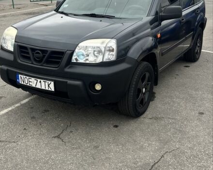 Серый Ниссан ИксТрейл, объемом двигателя 2 л и пробегом 420 тыс. км за 4000 $, фото 1 на Automoto.ua