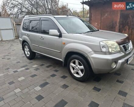 Серый Ниссан ИксТрейл, объемом двигателя 2.49 л и пробегом 286 тыс. км за 5800 $, фото 2 на Automoto.ua