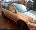 Сірий Ніссан ІксТрейл, об'ємом двигуна 2.5 л та пробігом 240 тис. км за 5800 $, фото 4 на Automoto.ua
