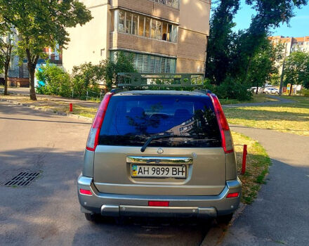 Сірий Ніссан ІксТрейл, об'ємом двигуна 2 л та пробігом 305 тис. км за 5200 $, фото 4 на Automoto.ua