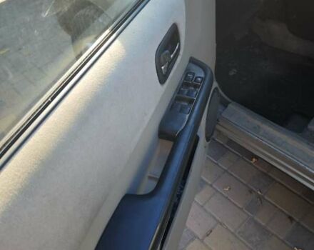 Сірий Ніссан ІксТрейл, об'ємом двигуна 2 л та пробігом 320 тис. км за 5500 $, фото 2 на Automoto.ua