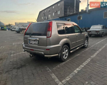 Серый Ниссан ИксТрейл, объемом двигателя 2.5 л и пробегом 320 тыс. км за 4800 $, фото 2 на Automoto.ua