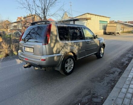 Серый Ниссан ИксТрейл, объемом двигателя 2 л и пробегом 333 тыс. км за 2999 $, фото 2 на Automoto.ua