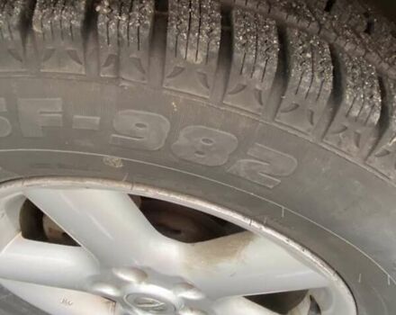 Сірий Ніссан ІксТрейл, об'ємом двигуна 2.5 л та пробігом 200 тис. км за 5400 $, фото 4 на Automoto.ua