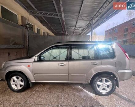 Серый Ниссан ИксТрейл, объемом двигателя 2 л и пробегом 262 тыс. км за 7079 $, фото 6 на Automoto.ua