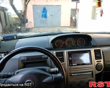 Сірий Ніссан ІксТрейл, об'ємом двигуна 2.5 л та пробігом 240 тис. км за 5800 $, фото 9 на Automoto.ua