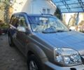 Серый Ниссан ИксТрейл, объемом двигателя 2 л и пробегом 320 тыс. км за 5500 $, фото 1 на Automoto.ua