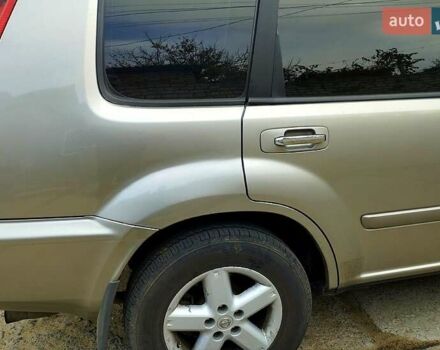 Серый Ниссан ИксТрейл, объемом двигателя 2.2 л и пробегом 240 тыс. км за 6700 $, фото 2 на Automoto.ua