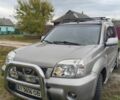 Серый Ниссан ИксТрейл, объемом двигателя 2 л и пробегом 297 тыс. км за 4500 $, фото 1 на Automoto.ua