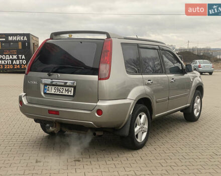 Серый Ниссан ИксТрейл, объемом двигателя 2 л и пробегом 246 тыс. км за 4499 $, фото 7 на Automoto.ua