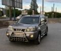Серый Ниссан ИксТрейл, объемом двигателя 2 л и пробегом 160 тыс. км за 7000 $, фото 1 на Automoto.ua