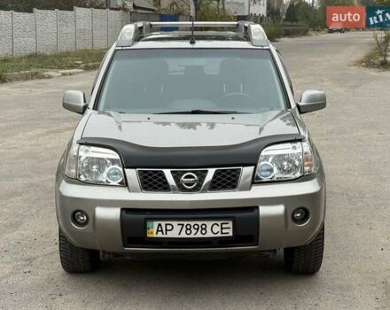 Серый Ниссан ИксТрейл, объемом двигателя 2.5 л и пробегом 265 тыс. км за 6000 $, фото 4 на Automoto.ua