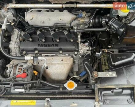 Серый Ниссан ИксТрейл, объемом двигателя 2.5 л и пробегом 265 тыс. км за 6000 $, фото 30 на Automoto.ua