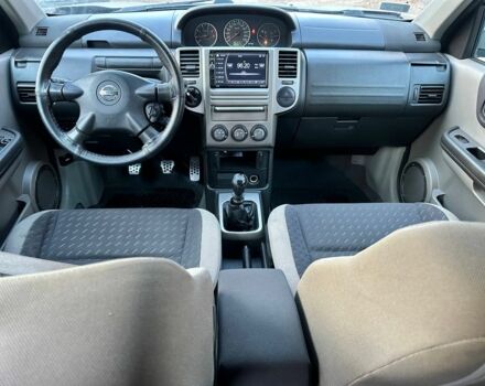 Серый Ниссан ИксТрейл, объемом двигателя 2.2 л и пробегом 319 тыс. км за 4000 $, фото 6 на Automoto.ua