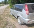 Серый Ниссан ИксТрейл, объемом двигателя 2.2 л и пробегом 260 тыс. км за 4000 $, фото 4 на Automoto.ua