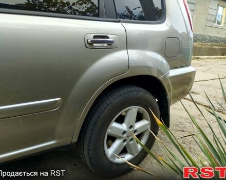 Серый Ниссан ИксТрейл, объемом двигателя 2.2 л и пробегом 240 тыс. км за 6700 $, фото 6 на Automoto.ua