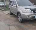Серый Ниссан ИксТрейл, объемом двигателя 2 л и пробегом 290 тыс. км за 4950 $, фото 1 на Automoto.ua