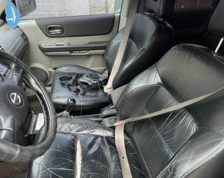 Серый Ниссан ИксТрейл, объемом двигателя 2.5 л и пробегом 299 тыс. км за 4600 $, фото 11 на Automoto.ua