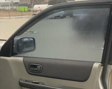 Серый Ниссан ИксТрейл, объемом двигателя 2 л и пробегом 246 тыс. км за 4499 $, фото 10 на Automoto.ua