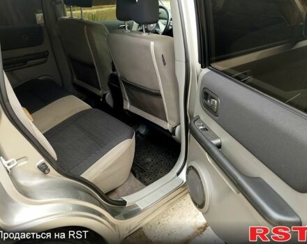 Серый Ниссан ИксТрейл, объемом двигателя 2.2 л и пробегом 240 тыс. км за 6700 $, фото 8 на Automoto.ua