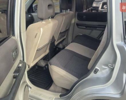 Серый Ниссан ИксТрейл, объемом двигателя 2.18 л и пробегом 337 тыс. км за 5950 $, фото 10 на Automoto.ua