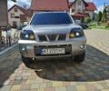Сірий Ніссан ІксТрейл, об'ємом двигуна 2 л та пробігом 270 тис. км за 8599 $, фото 5 на Automoto.ua
