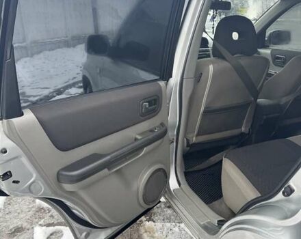 Сірий Ніссан ІксТрейл, об'ємом двигуна 2.18 л та пробігом 247 тис. км за 6800 $, фото 12 на Automoto.ua