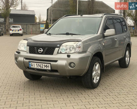 Серый Ниссан ИксТрейл, объемом двигателя 2 л и пробегом 246 тыс. км за 4499 $, фото 3 на Automoto.ua